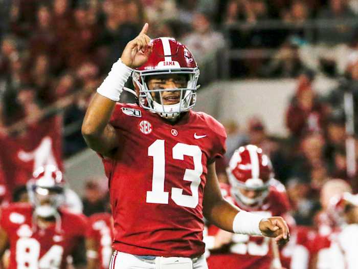 Oct 19, 2019; Tuscaloosa, AL, USA; Alabama Crimson Tide quarterback Tua Tagovailoa (13) celebrates after a touchdown during the first half of an NCAA football game against the Tennessee Volunteers at Bryant-Denny Stadium. Mandatory Credit: Butch Dill-USA TODAY Sports